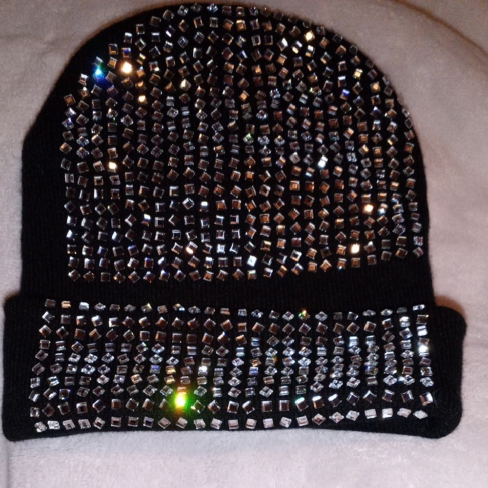 Elegant Black Hat with Silver Embellishments